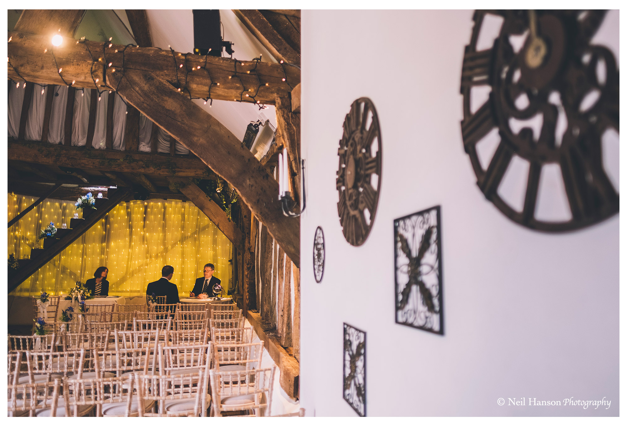 Groom meets with the registrar at Old Luxters Barn Wedding Venue