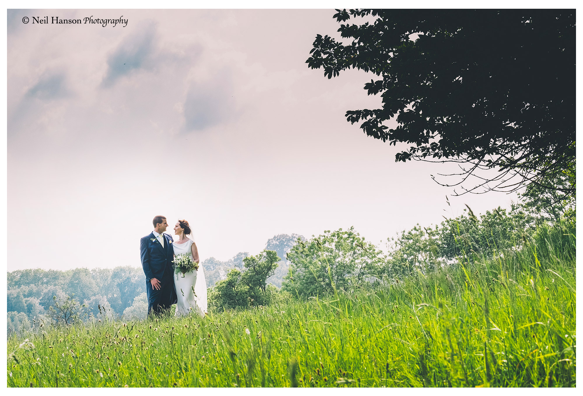 Bride and Groom in the Chilterns Hills at Old Luxters Barn Wedding