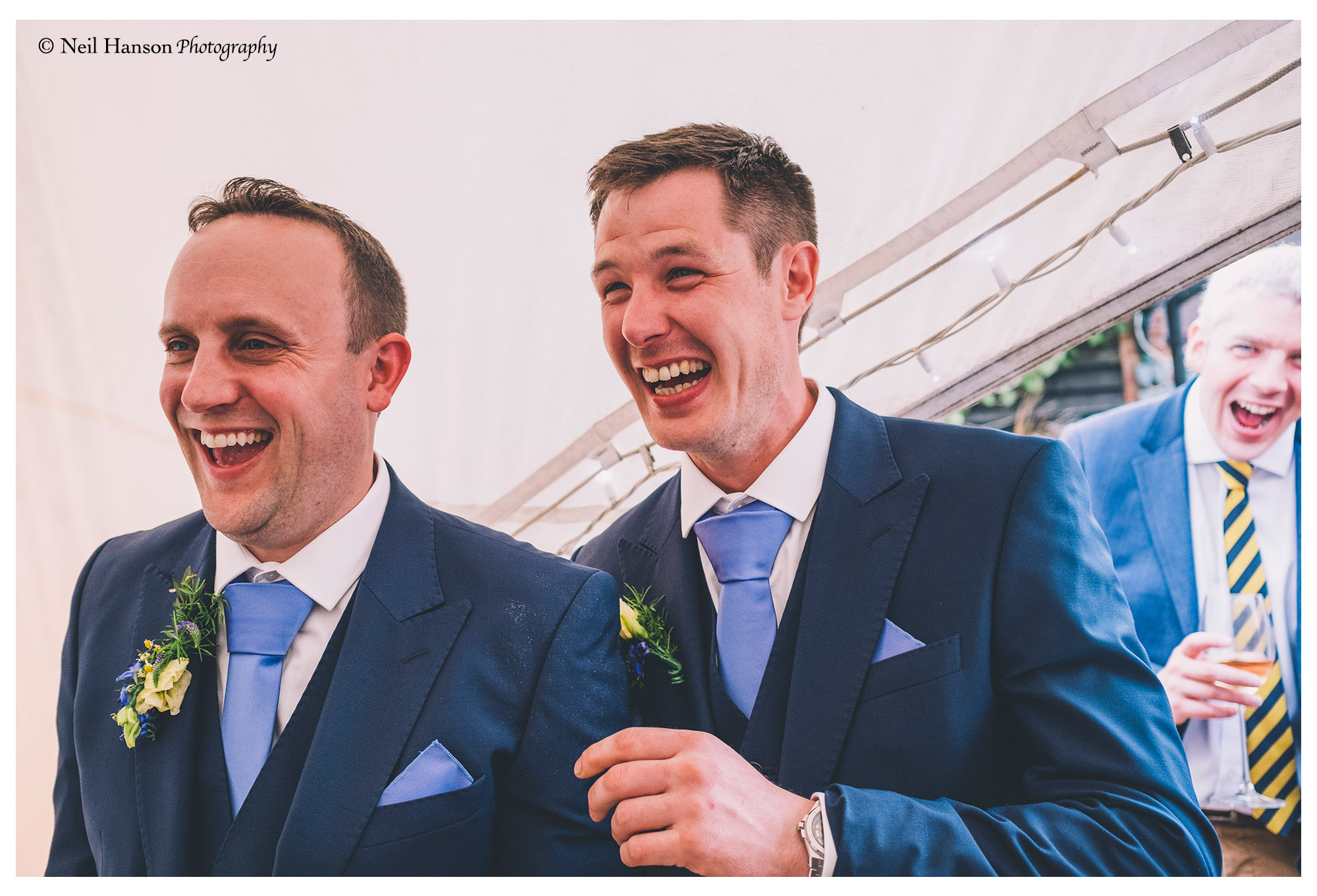 Best men laughing at grooms speech