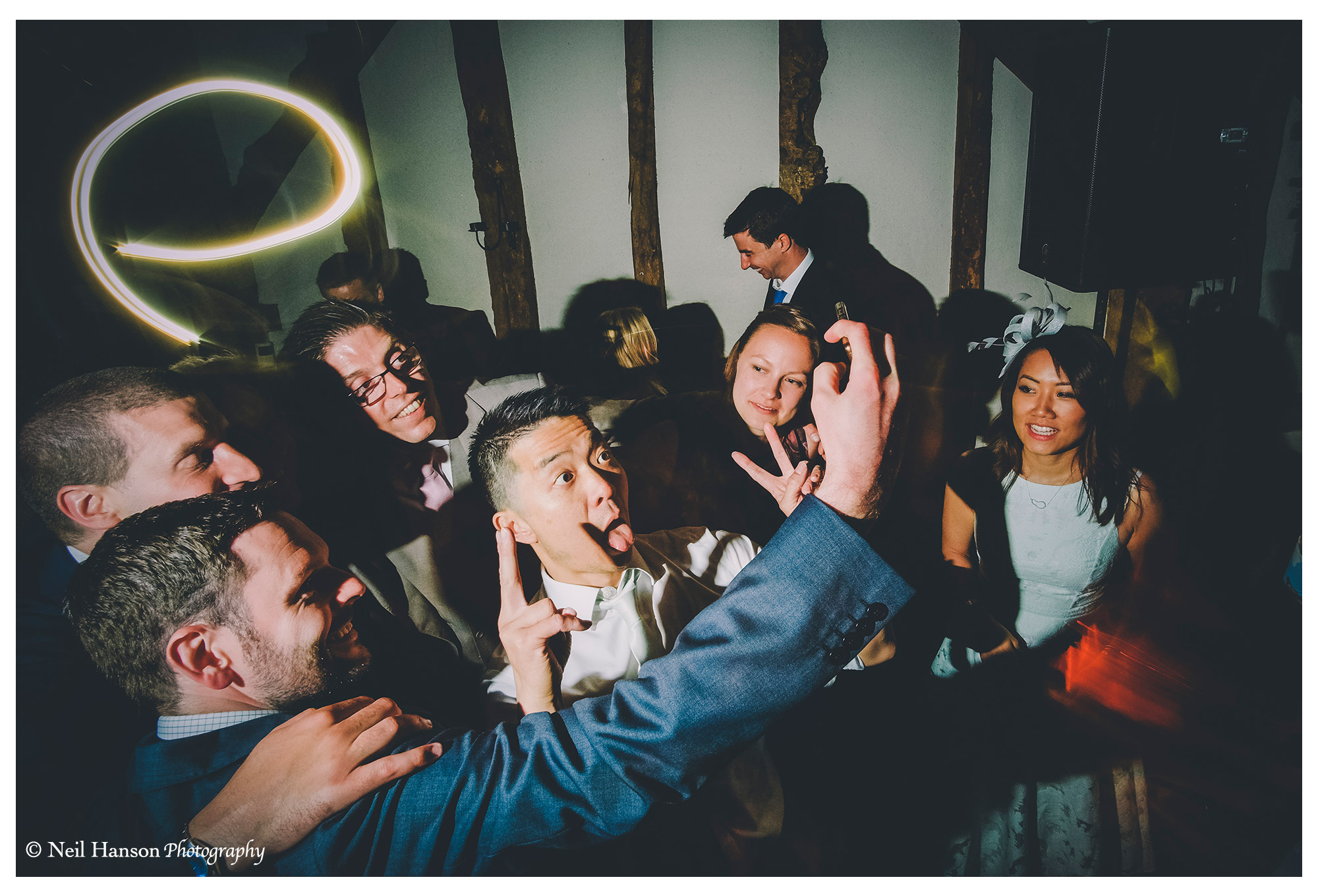 dancing wedding guests at Old Luxters Barn